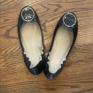 Tory Burch Black Flats with Gold Emblem